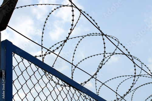 fence with barbed wire close-up