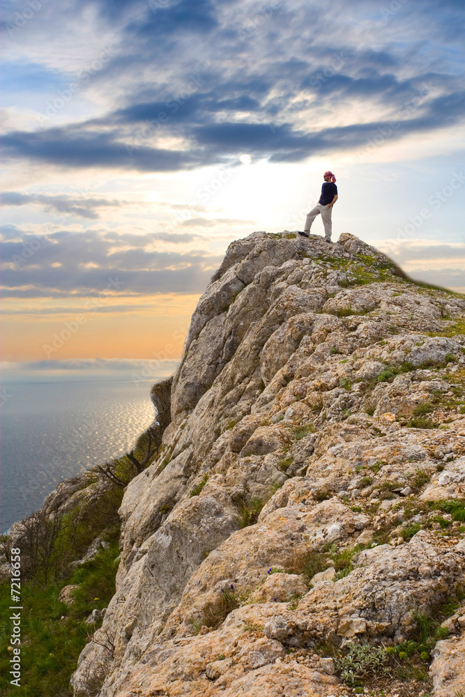 Active people - Person climbing a cliff