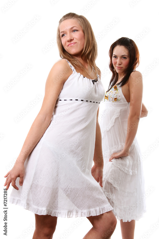 two women in white dress