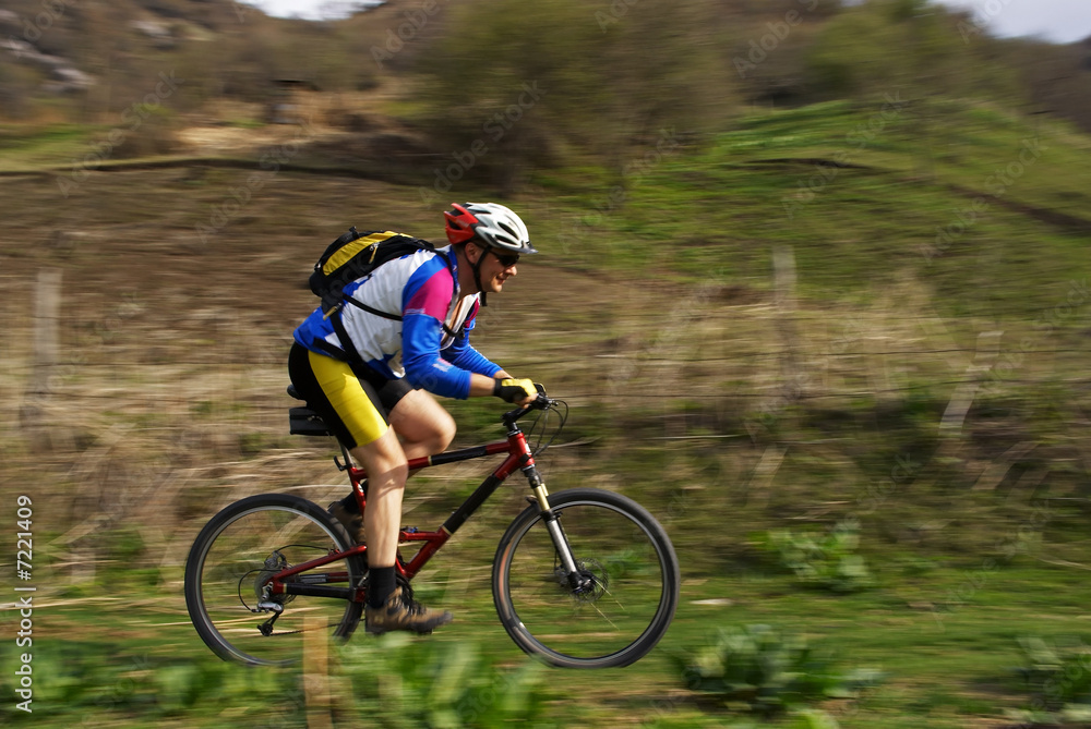 Naklejka premium Speed motion mountain biker