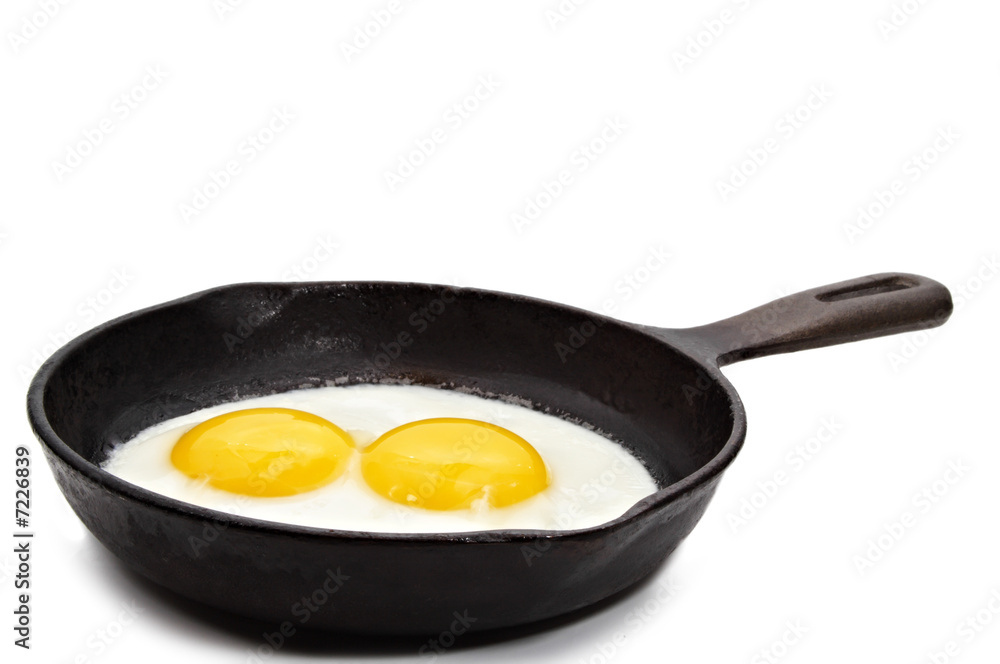 egg on a cast-iron pan egg on a cast-iron pan