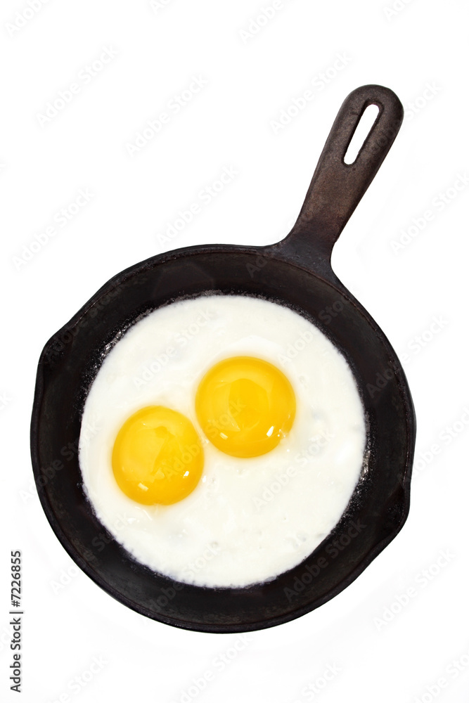 egg on a cast-iron pan egg on a cast-iron pan