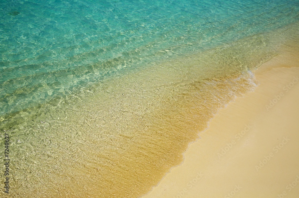 Blue water ripples near the shore