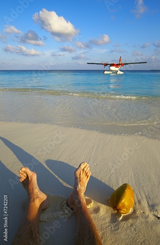Pilot has a rest on a beach