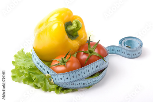 Photos vegetables and blue measure tape
