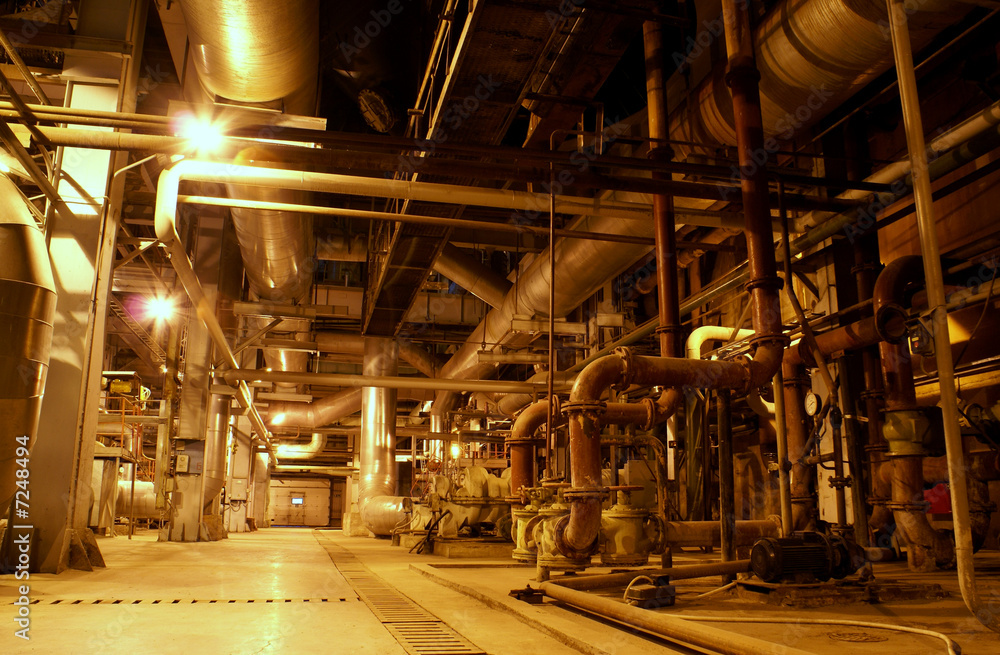 Equipment, cables and piping as found inside of a modern industr Equipment, cables and piping as found inside of a modern industr
