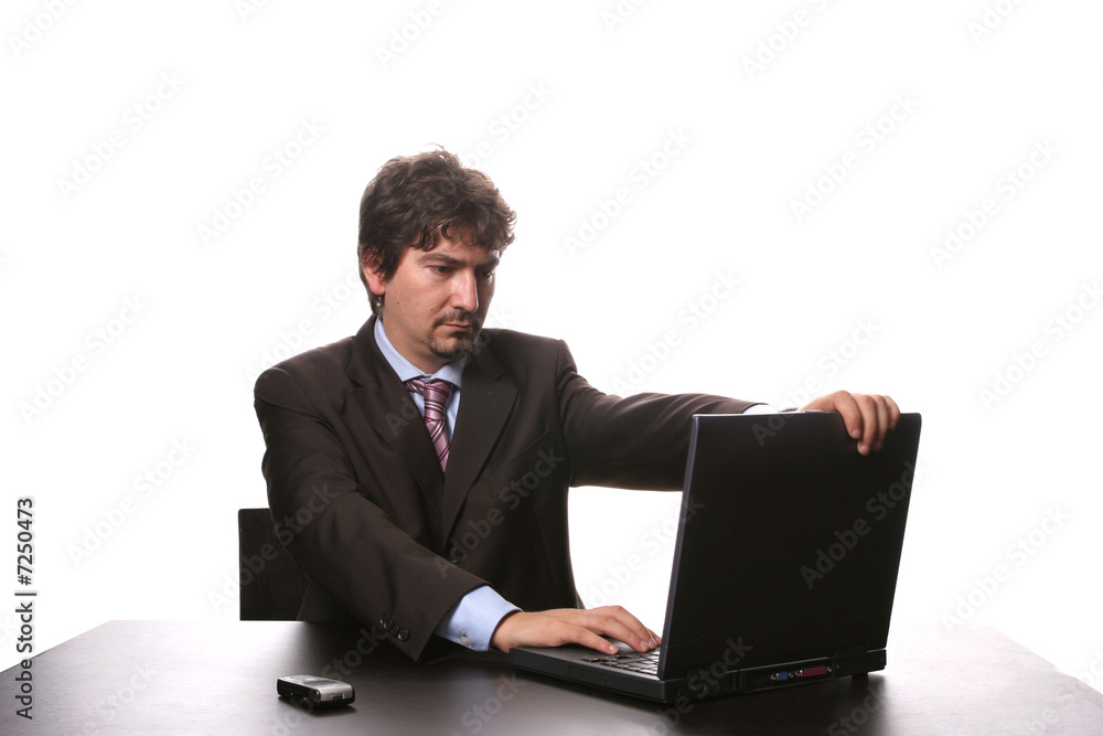 young business man working on laptop isolated young business man working on laptop isolated