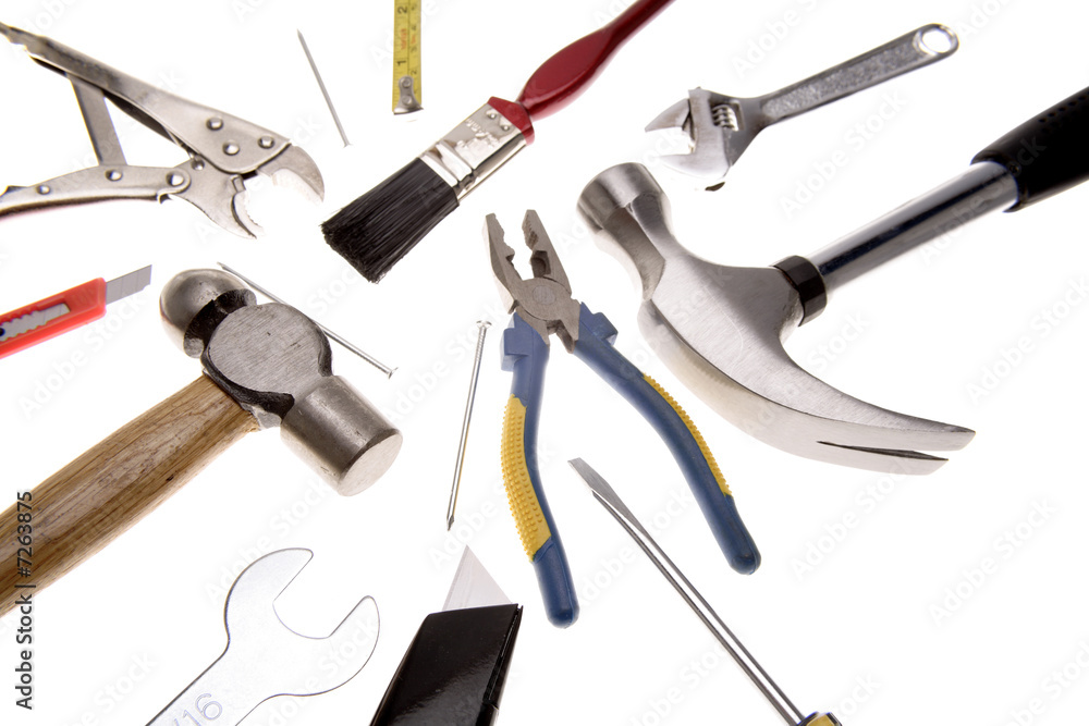 Assortment of tools over white Assortment of tools over white