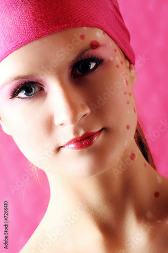 portrait of a beautiful woman with dots on her skin