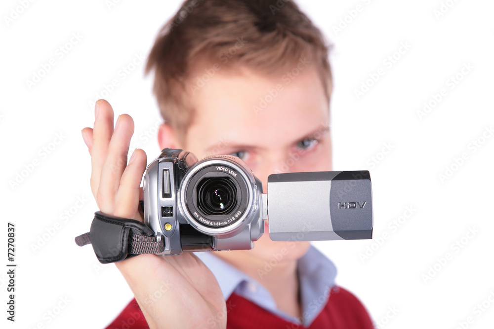 Boy in red jacket with HDV camera Boy in red jacket with HDV camera