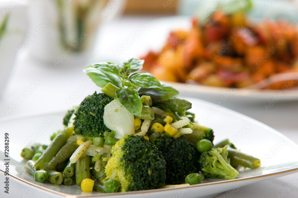 Fresh green vegetable salad with corn and basil Fresh green vegetable salad with corn and basil