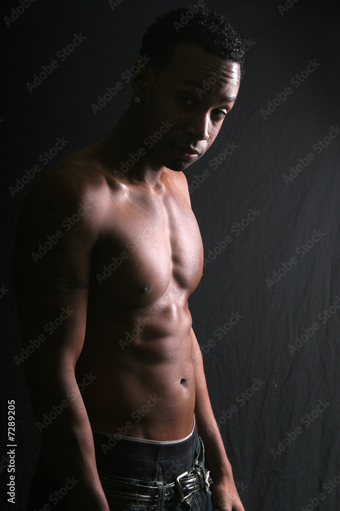 Fototapeta premium Strong black man looking at the camera