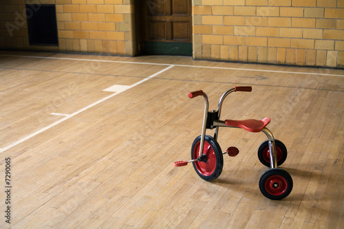 Tricycle in empty gym