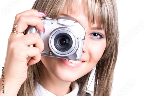 Young woman with digital camera