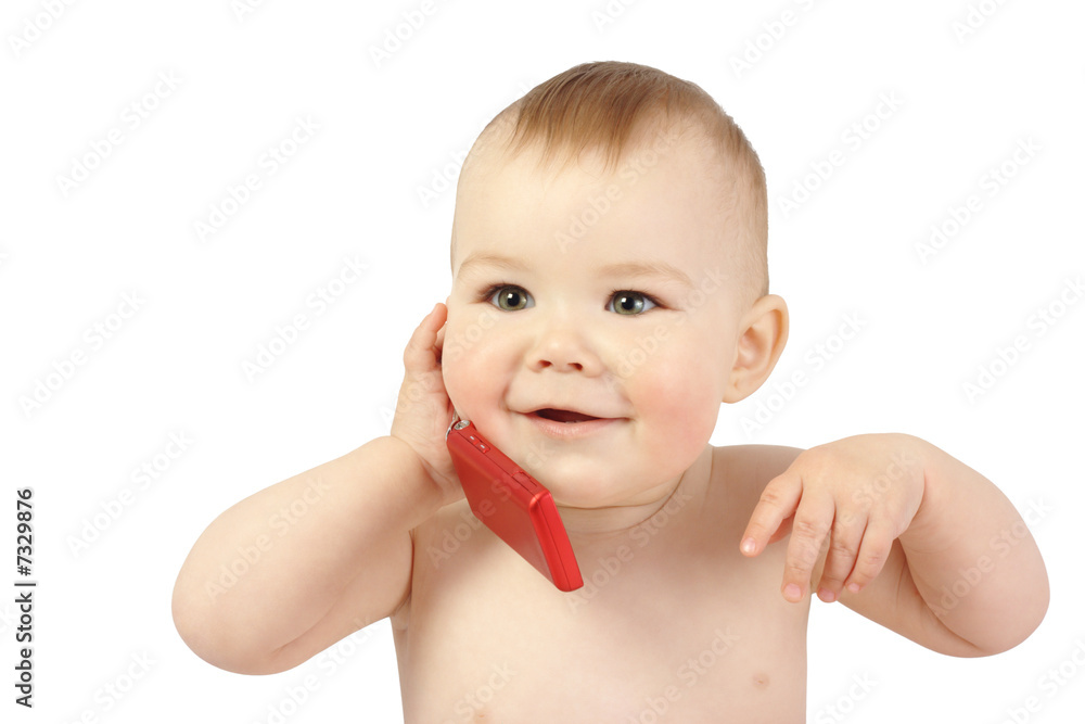 Cute child talking to a cell phone Cute child talking to a cell phone