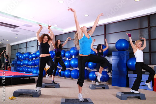 girls stepping in a fitness center