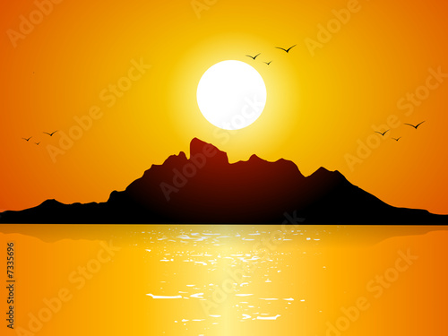Paradise tropical island at sunset