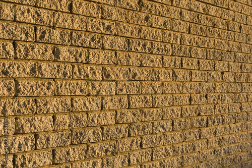 The patterns created by the bricks in a facebrick wall photo