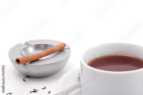 Tea, ashtray and newspaper