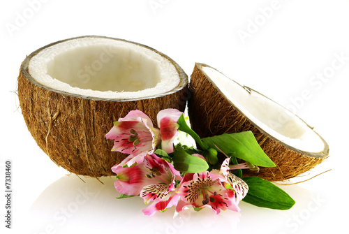 two pieces of ripe coconut with flowers