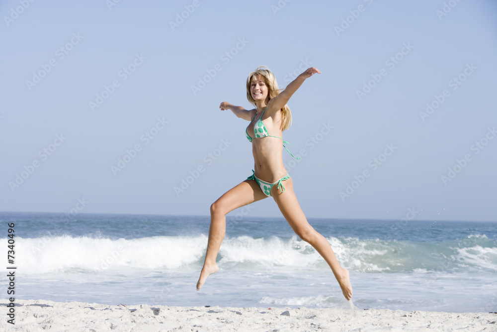 Young woman on beach holiday Young woman on beach holiday