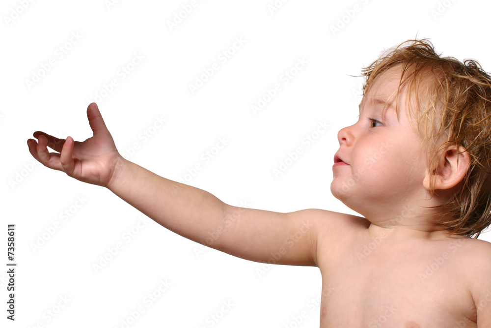 toddler reaching for object