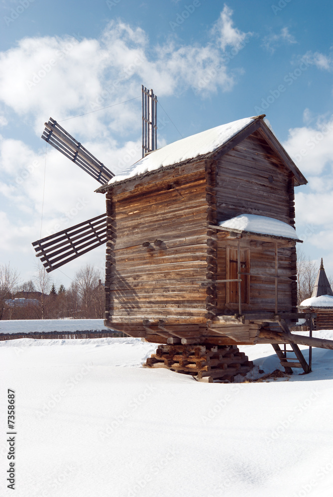 Wind mill  .winter rural landscape