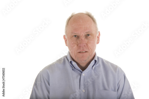 Old Guy in Blue Dress Shirt with Serious Look