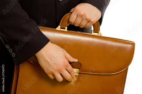 Businessman is opening his briefcase