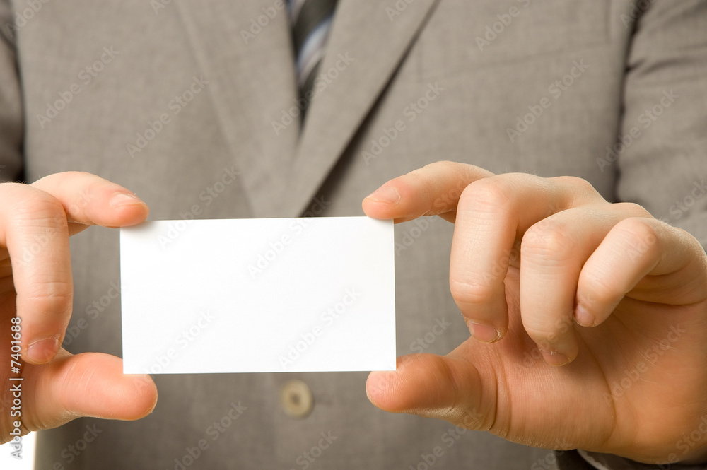 Fototapeta premium Blank business card in the hands of a businessman