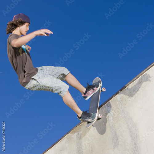 Skateboard tricks at a skateboard park