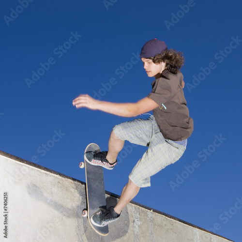 Skateboard tricks at a skateboard park