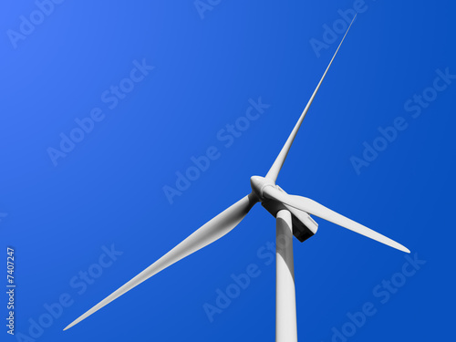 Wind turbine isolated on blue photo