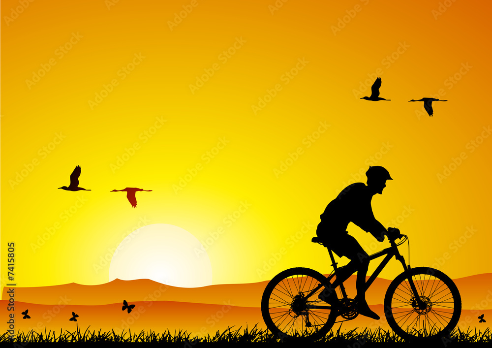 Obraz premium Mountain bike at sunset