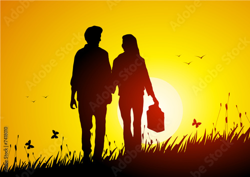 Loving couple at sunset