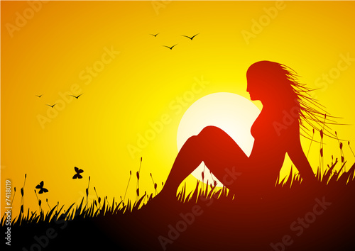 Girl relaxing at sunset