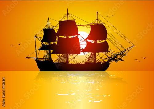 Sailing ship at sunset