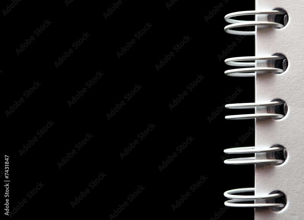 Blank spiral notepad isolated on black Blank spiral notepad isolated on black