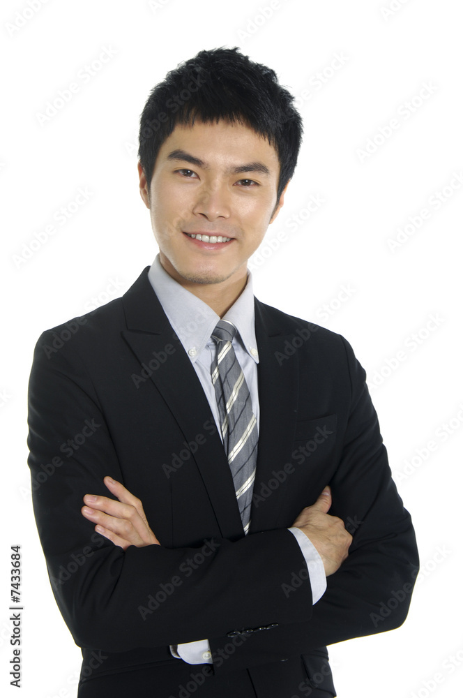 Businessman on white holding hand out for handshake Businessman on white holding hand out for handshake
