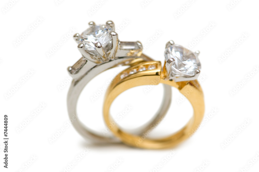 Two wedding diamond rings isolated on white Two wedding diamond rings isolated on white