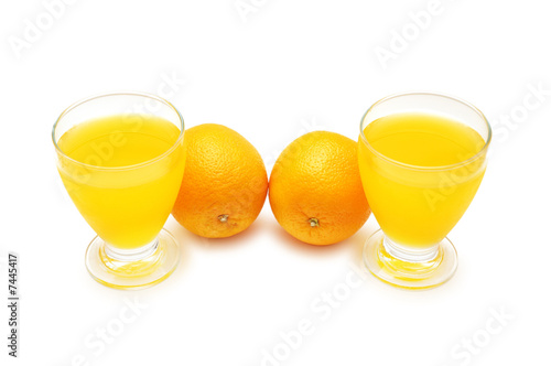 Twi oranges and orange juice isolated on white