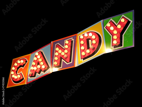 Light bulb candy sign isolated on black