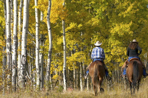 Couple On Horseback In Autumn