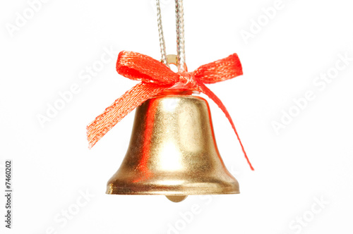 handbell with red ribbon