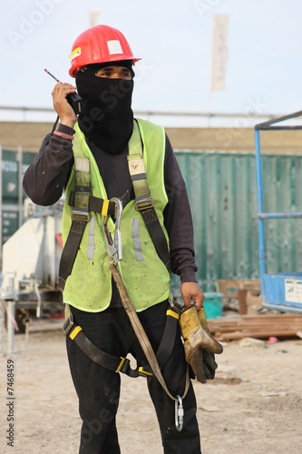 Construction Worker Calling For Back Up