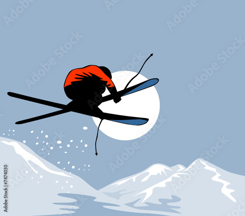 Skier jumping mountains