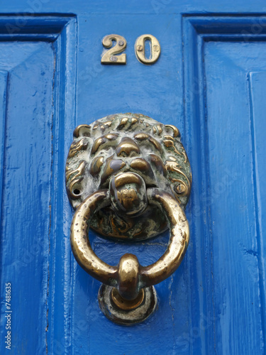 Lion face door knocker