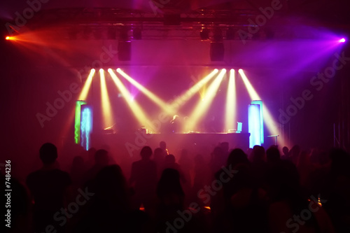 Dancing people in an underground club