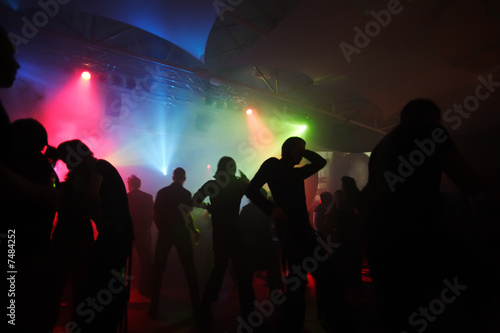 Dancing people in an underground club © DWP