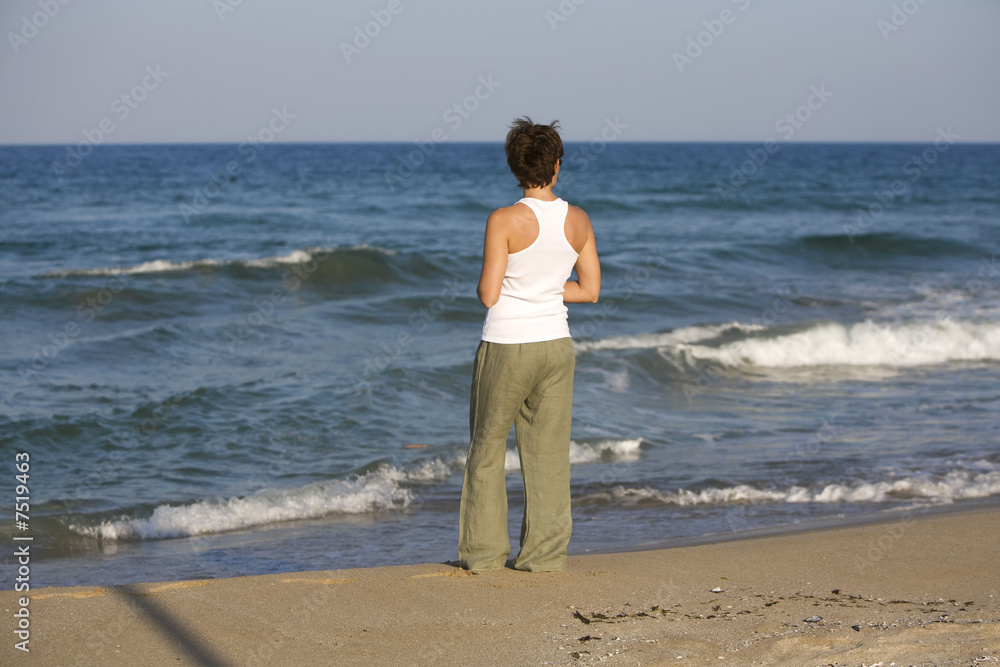 Lonely girl on the beach